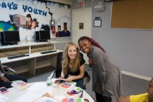 Rebecca Newberger-Goldstein with a Union Settlement student